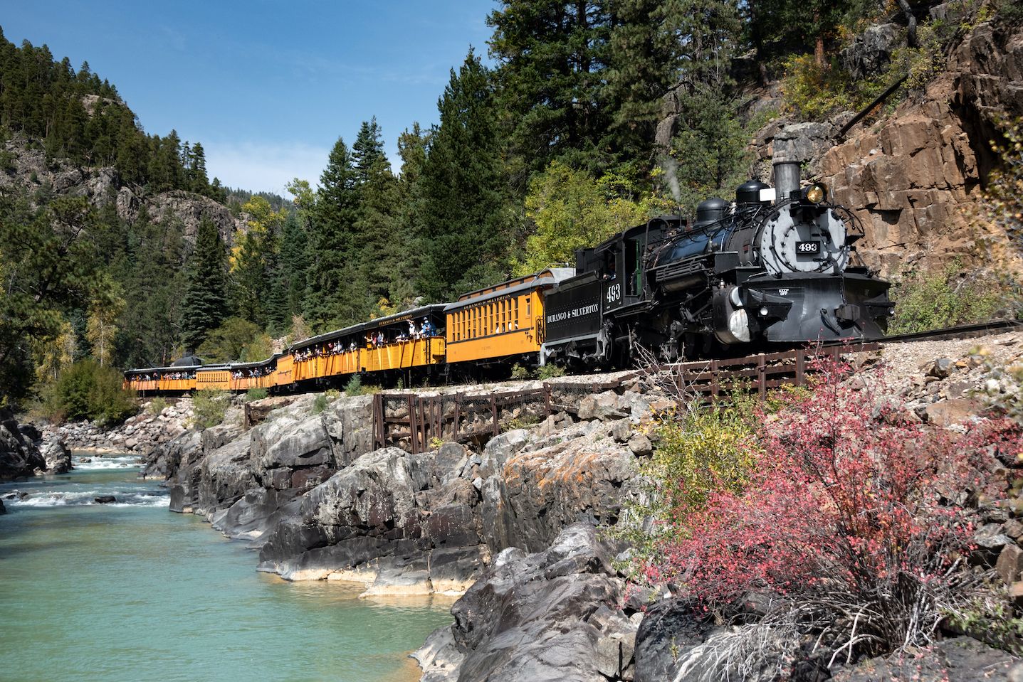 Durango Train's Classic Cascade Canyon Express steaming along the Animas River