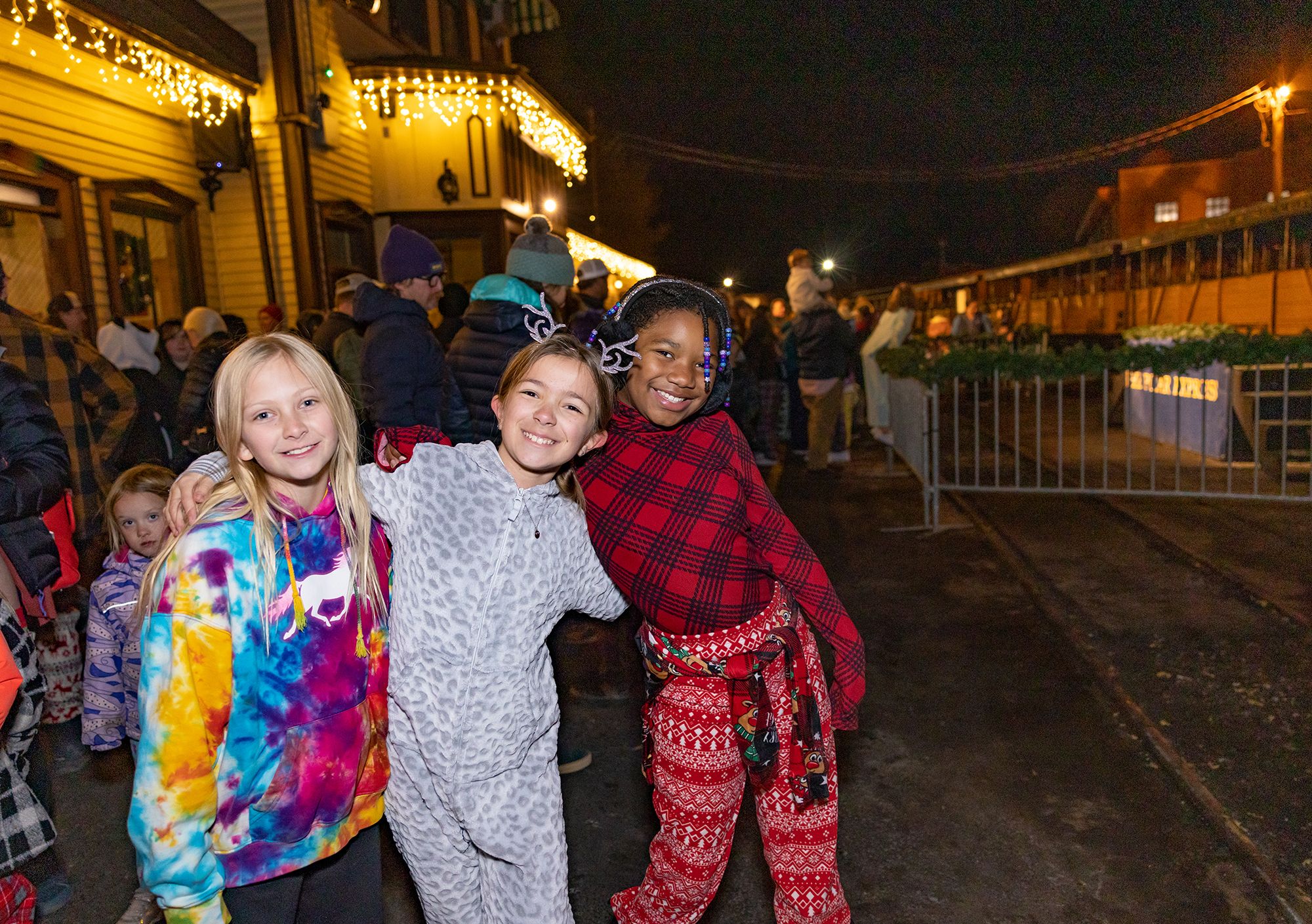Girls outside Polar Express train