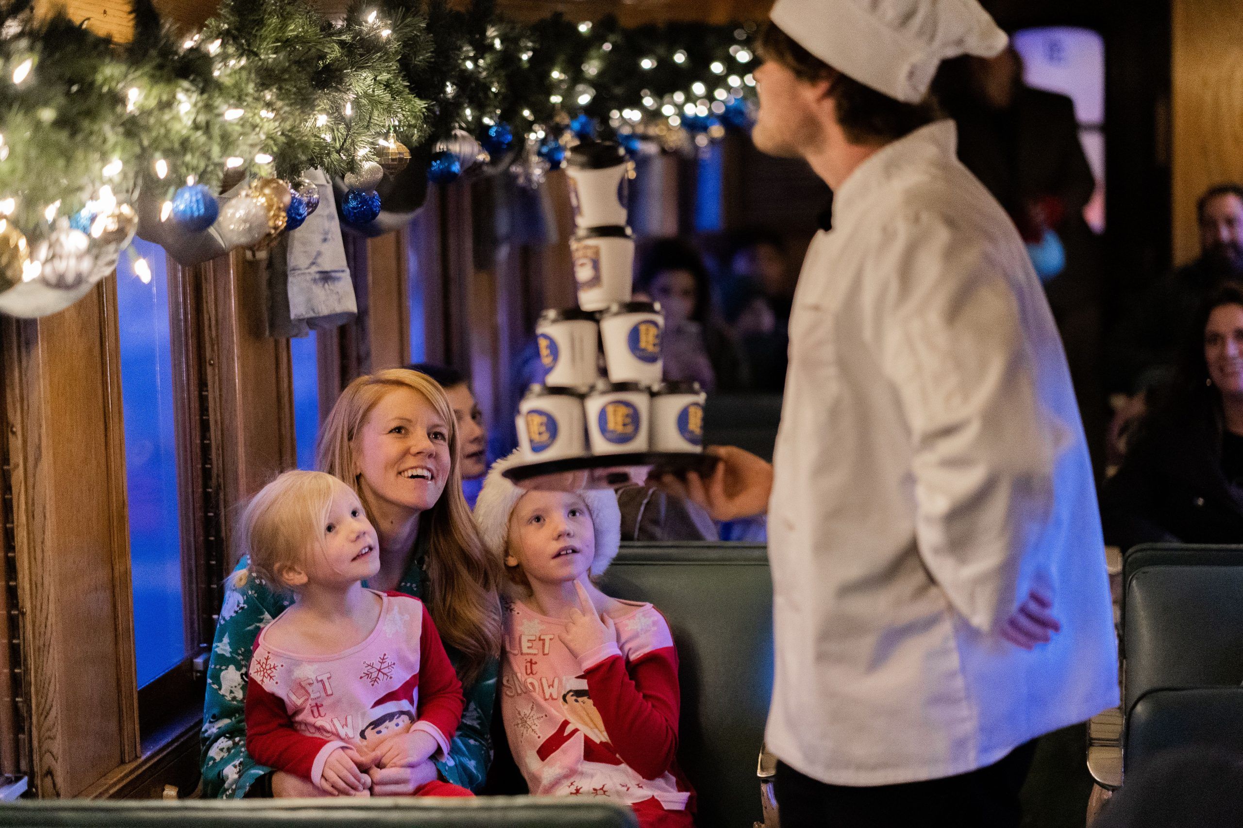 Chef with twins christmas train