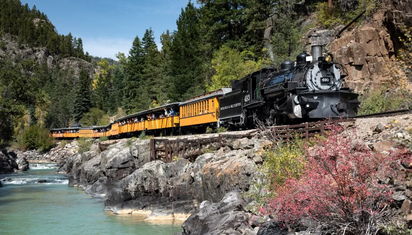 Durango Train's Classic Cascade Canyon Express steaming along the Animas River